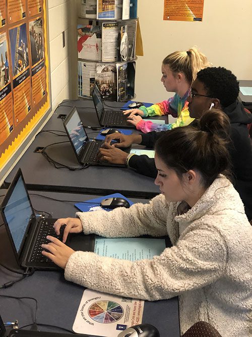 Students working on laptops